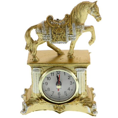 Golden table clock with horse