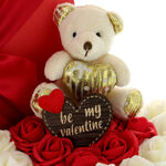 Arrangement with roses and a valentine bear 4