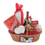 Easter gift basket with wine, sweets and Holy Family icon