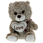 Plush cream-brown teddy bear with heart