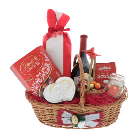 Easter gift basket with wine, sweets and Holy Family icon