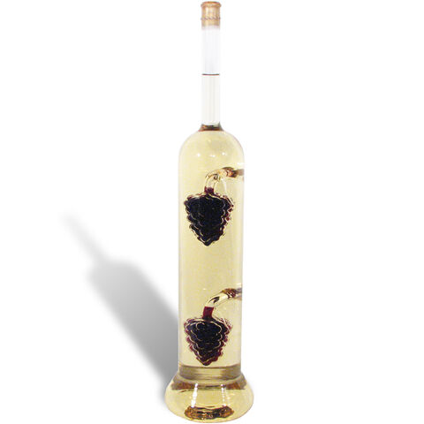 Luxurious wine bottle with 2 bunches of grapes