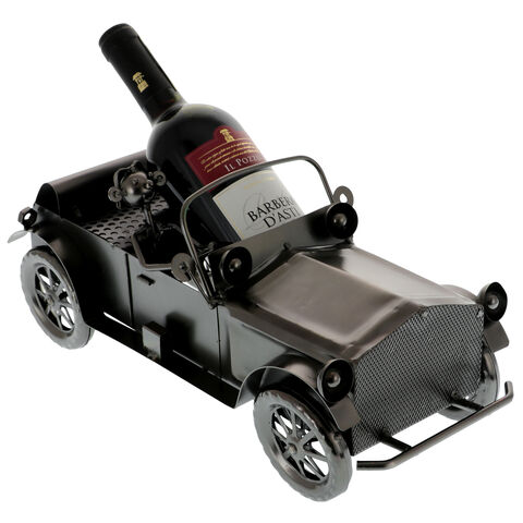 Metal support vintage car with bottle