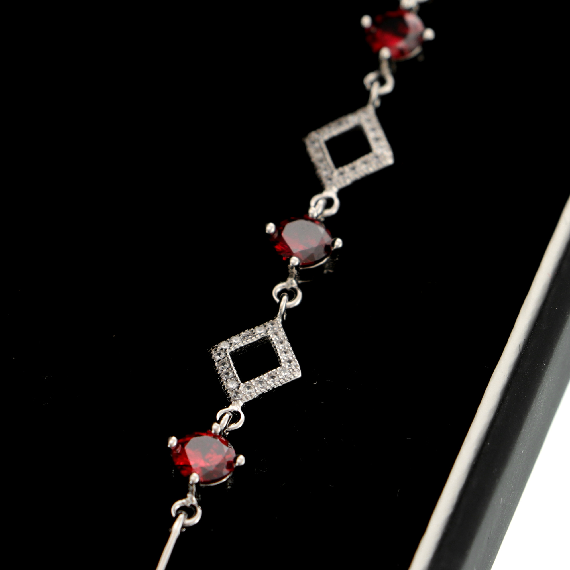 Red and silver shop bracelet